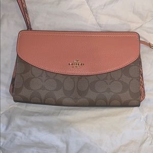 Brand new without tags Coach coral clutch